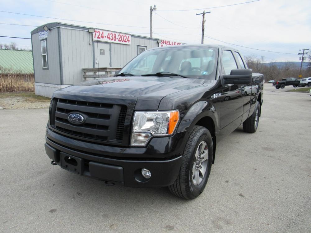 2012 BLACK /GRAY Ford F-150 Lariat SuperCab 6.5-ft. Bed 4WD (1FTFX1EF3CK) with an 5.0L V8 engine, 6-Speed Automatic transmission, located at 6 Oliver Rd., Uniontown, PA, 15401, (724) 438-2024, 0.000000, 0.000000 - Photo #0
