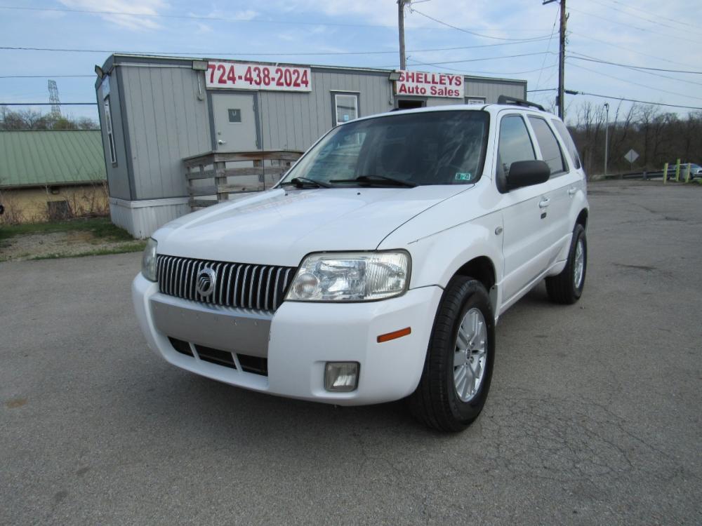 2007 White /BLACK/GRAY Mercury Mariner Luxury 4WD (4M2YU91157K) with an 3.0L V6 DOHC 24V engine, 4-Speed Automatic transmission, located at 6 Oliver Rd., Uniontown, PA, 15401, (724) 438-2024, 0.000000, 0.000000 - Photo #0