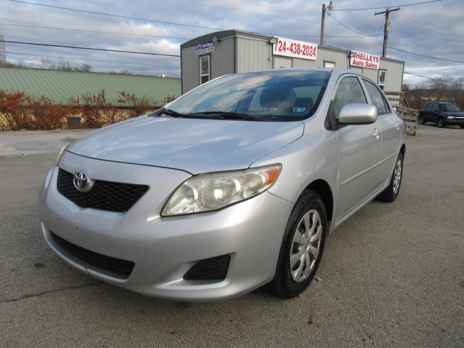 2009 SIlver /Gray Toyota Corolla LE (JTDBL40E299) with an 1.8L L4 DOHC 16V engine, 5-Speed Automatic Overdrive transmission, located at 6 Oliver Rd., Uniontown, PA, 15401, (724) 438-2024, 0.000000, 0.000000 - 2009 Toyota Corolla LE...GRAY CLOTH INTERIOR...POWER W/L/M/CRUISE...AM/FM CD...A/C...NEW TIRES...DON'T DELAY CALL TODAY!!! - Photo #0