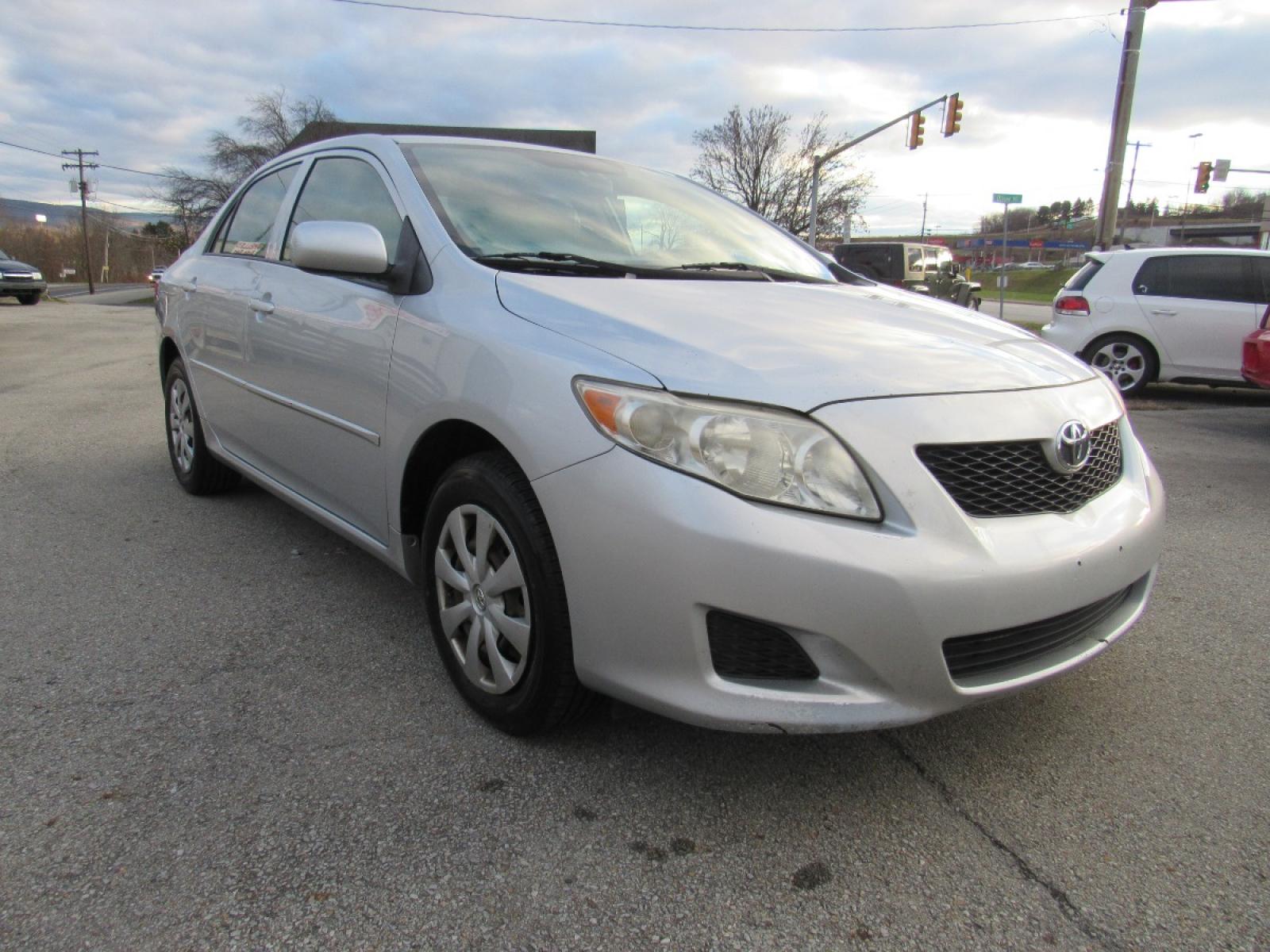 2009 SIlver /Gray Toyota Corolla LE (JTDBL40E299) with an 1.8L L4 DOHC 16V engine, 5-Speed Automatic Overdrive transmission, located at 6 Oliver Rd., Uniontown, PA, 15401, (724) 438-2024, 0.000000, 0.000000 - 2009 Toyota Corolla LE...GRAY CLOTH INTERIOR...POWER W/L/M/CRUISE...AM/FM CD...A/C...NEW TIRES...DON'T DELAY CALL TODAY!!! - Photo #2