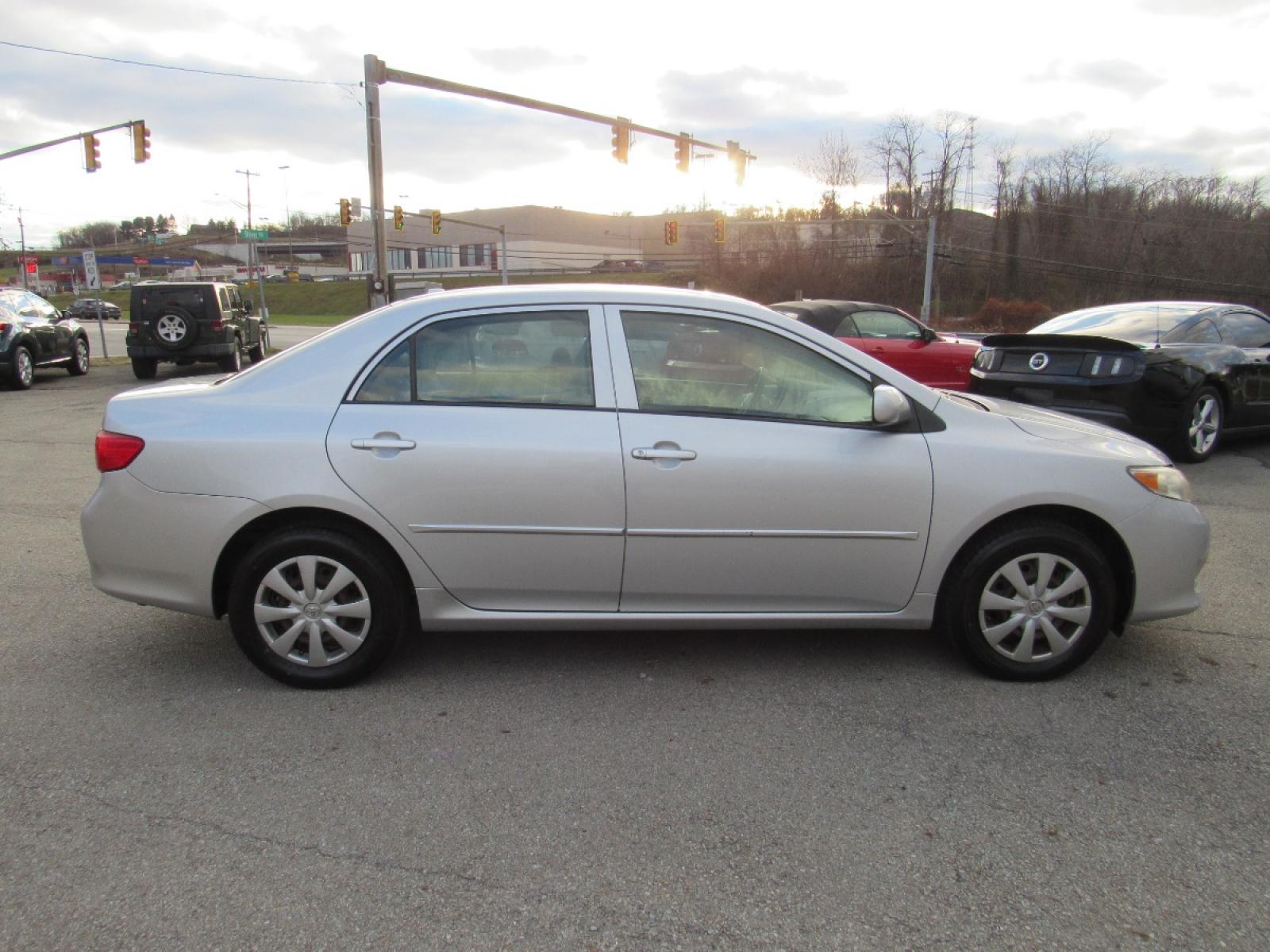 2009 SIlver /Gray Toyota Corolla LE (JTDBL40E299) with an 1.8L L4 DOHC 16V engine, 5-Speed Automatic Overdrive transmission, located at 6 Oliver Rd., Uniontown, PA, 15401, (724) 438-2024, 0.000000, 0.000000 - 2009 Toyota Corolla LE...GRAY CLOTH INTERIOR...POWER W/L/M/CRUISE...AM/FM CD...A/C...NEW TIRES...DON'T DELAY CALL TODAY!!! - Photo #3