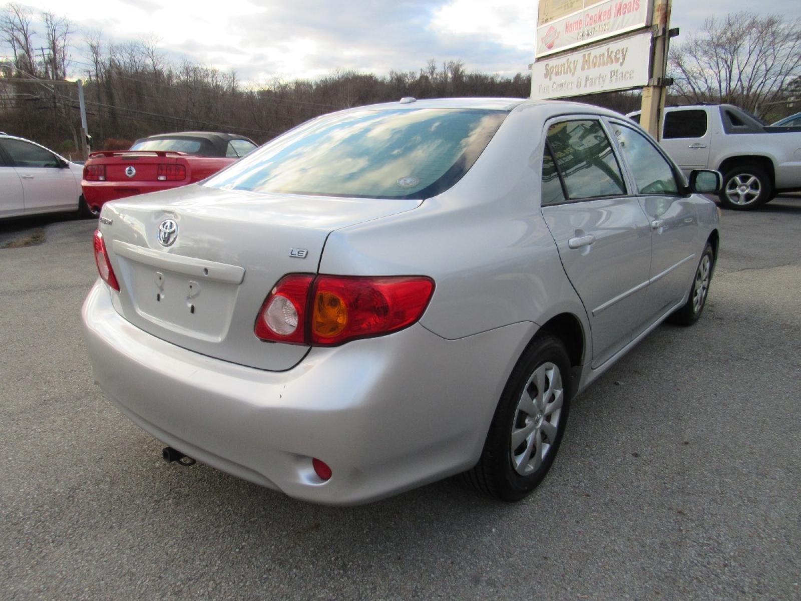 2009 SIlver /Gray Toyota Corolla LE (JTDBL40E299) with an 1.8L L4 DOHC 16V engine, 5-Speed Automatic Overdrive transmission, located at 6 Oliver Rd., Uniontown, PA, 15401, (724) 438-2024, 0.000000, 0.000000 - 2009 Toyota Corolla LE...GRAY CLOTH INTERIOR...POWER W/L/M/CRUISE...AM/FM CD...A/C...NEW TIRES...DON'T DELAY CALL TODAY!!! - Photo #4