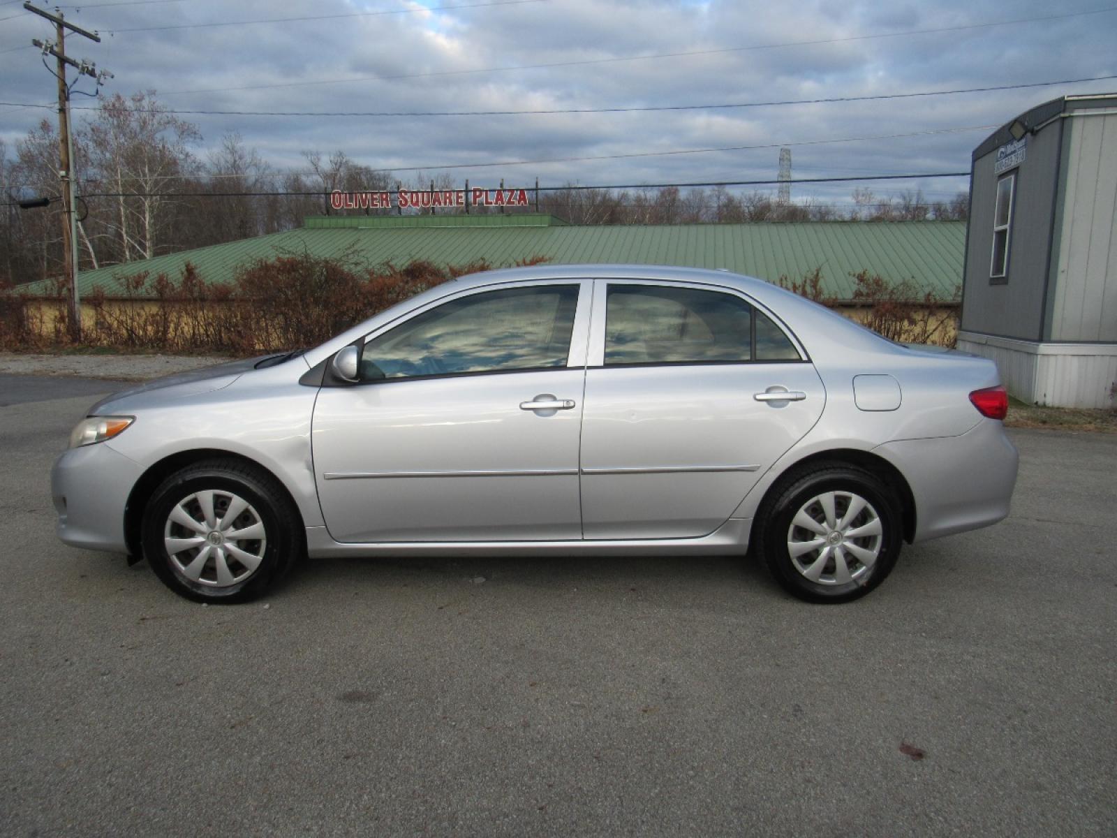 2009 SIlver /Gray Toyota Corolla LE (JTDBL40E299) with an 1.8L L4 DOHC 16V engine, 5-Speed Automatic Overdrive transmission, located at 6 Oliver Rd., Uniontown, PA, 15401, (724) 438-2024, 0.000000, 0.000000 - 2009 Toyota Corolla LE...GRAY CLOTH INTERIOR...POWER W/L/M/CRUISE...AM/FM CD...A/C...NEW TIRES...DON'T DELAY CALL TODAY!!! - Photo #7